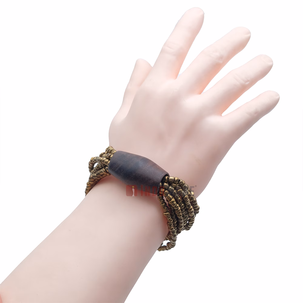 Beautiful Gold 11-Strand Elastic Glass Beaded Bracelet with Dark Hardwood Bead - Image 5
